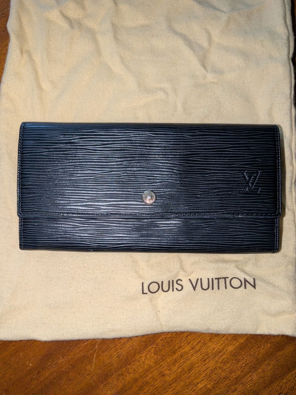 Louis Vuitton Black Epi Leather Sarah Snap Wallet.